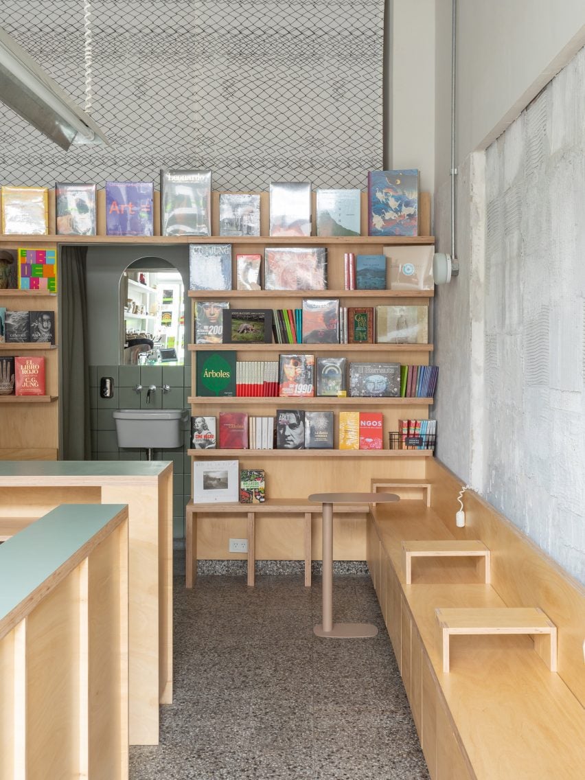 A bookstore with light wood furniture