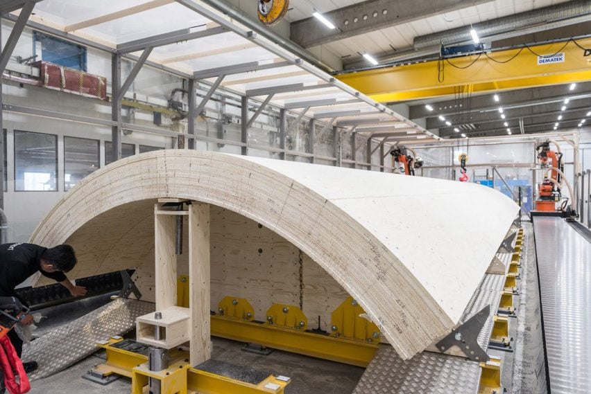 Photo of a giant module of curved laminated veneer lumber being engineered in a factory