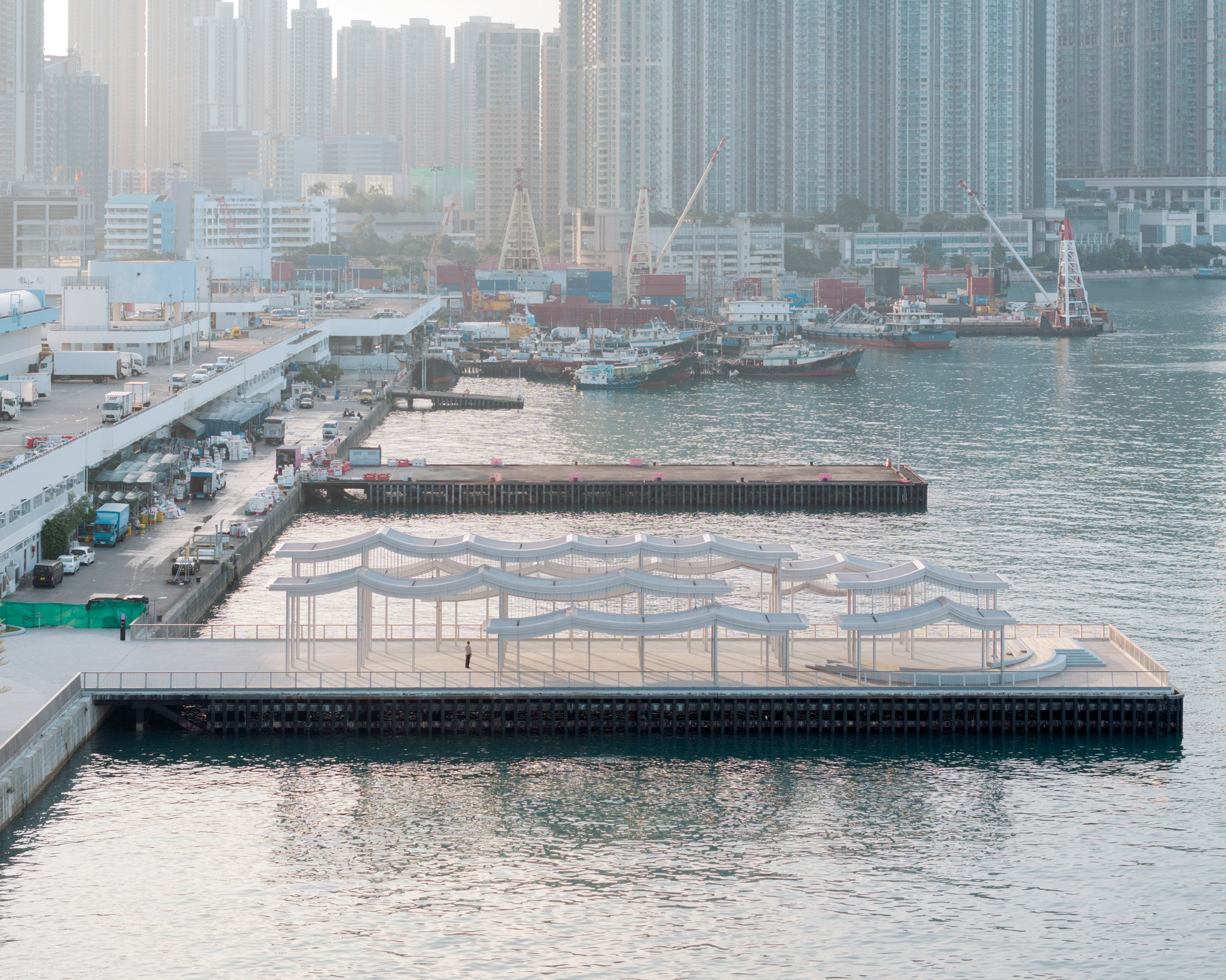 Undulating canopy roof on a Hong Kong pier by New Office Works