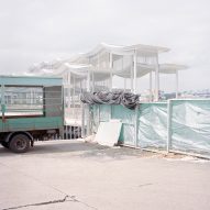 Promenade on a Hong Kong harbour with a steel canopy