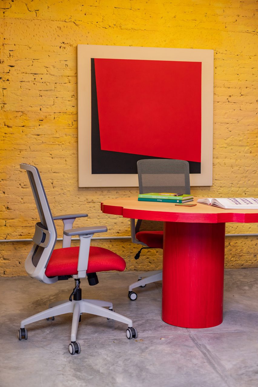 A red table and office chair