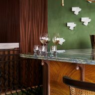 Bar with green wall behind in Fogo