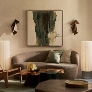 Two off-white lamps either side of sofa
