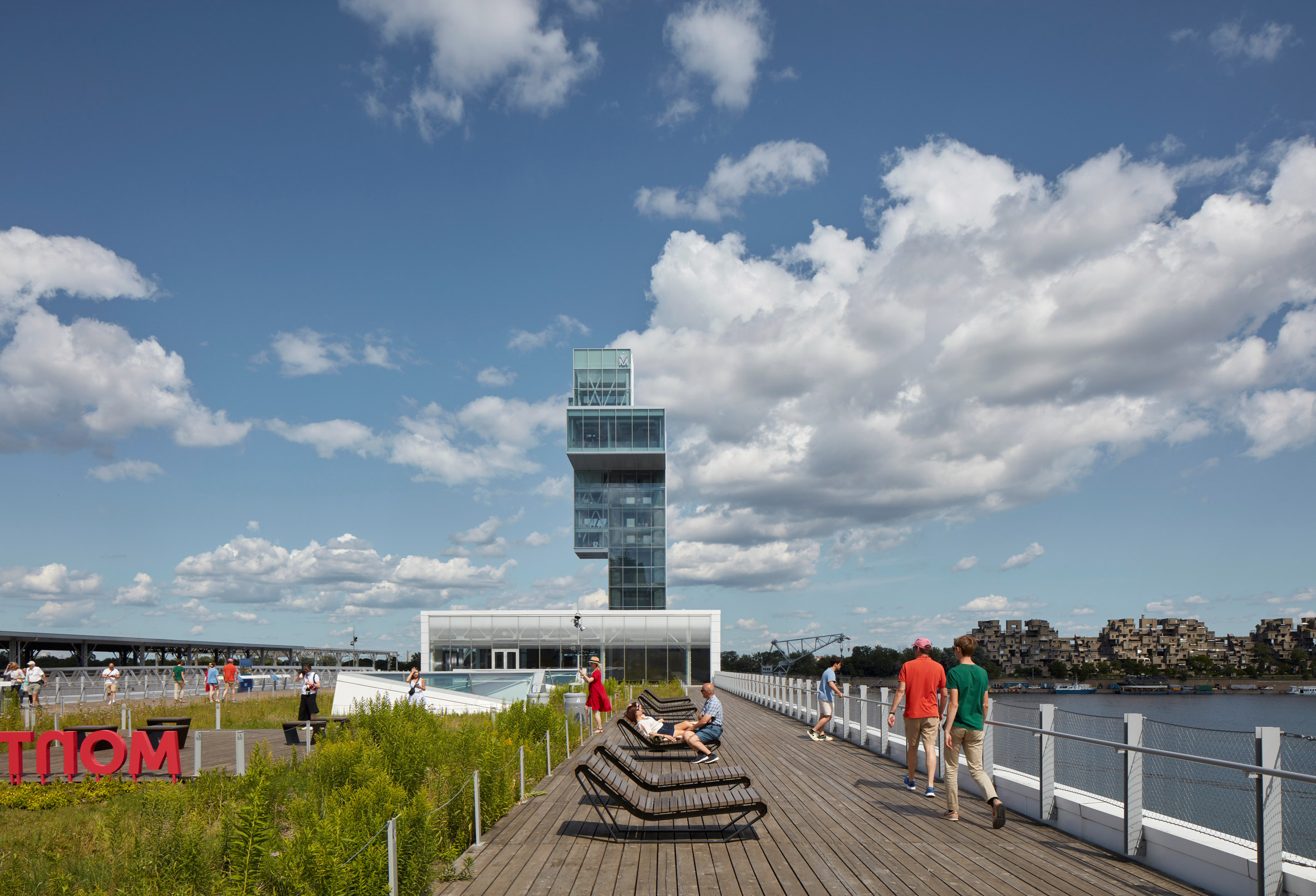 Outdoor space with tower on pier in background