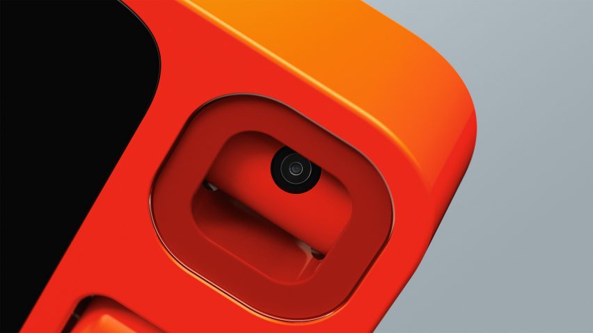 Close-up image of the rotatable camera lens on the Rabbit R1 device