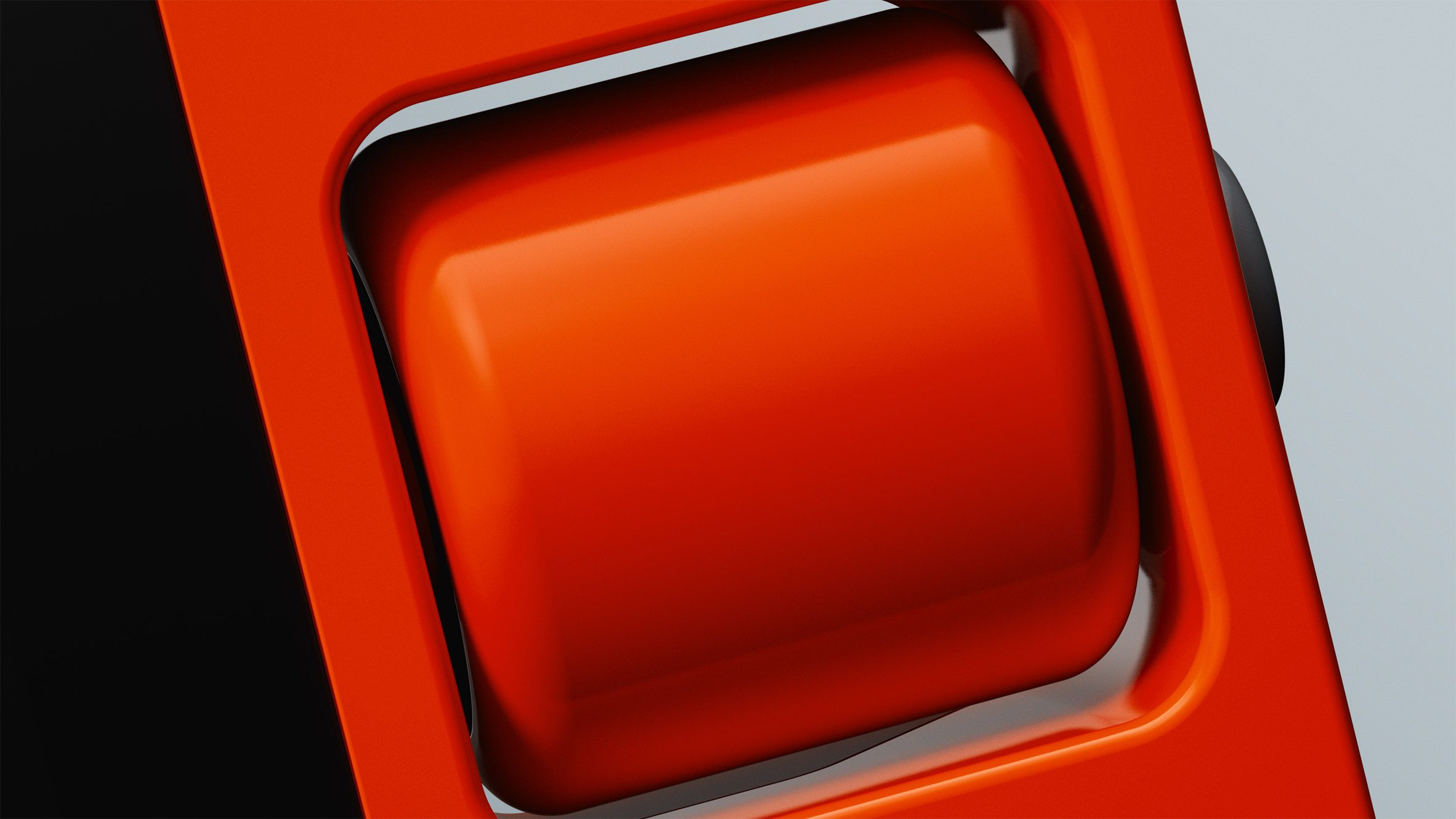 Close-up image of a scroll wheel on a bright orange gadget