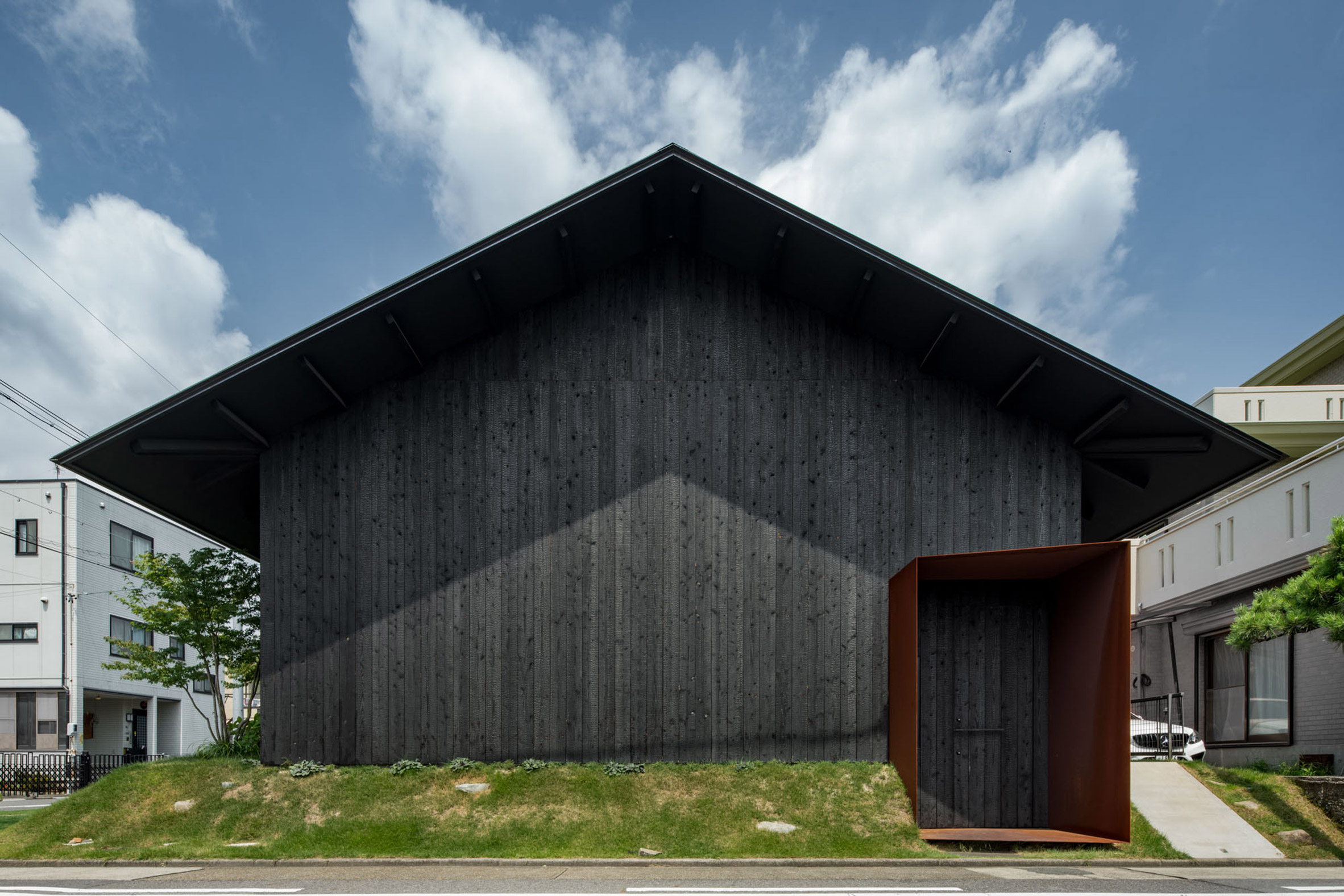 Facade view of Japanese home by Slow