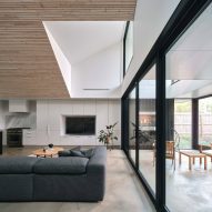 Room with wood clad ceiling