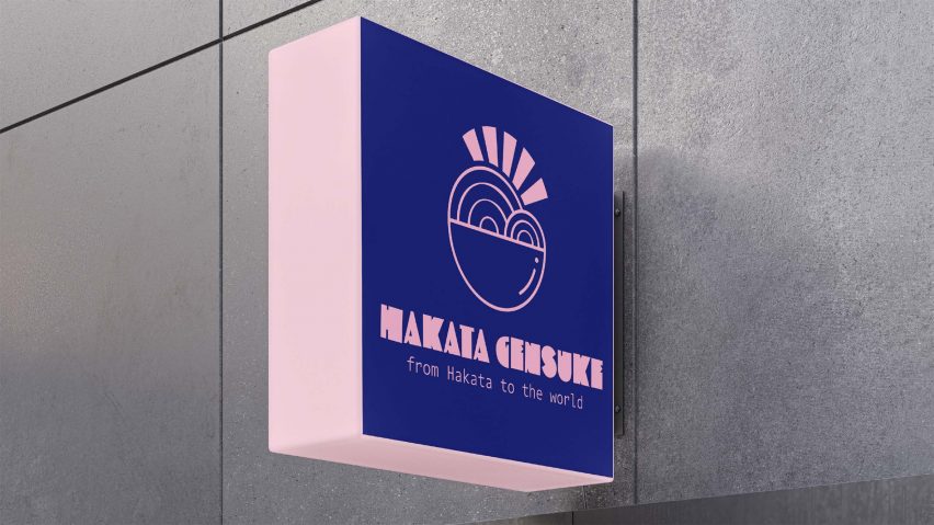 PInk and dark blue sign on building for sushi restaurant
