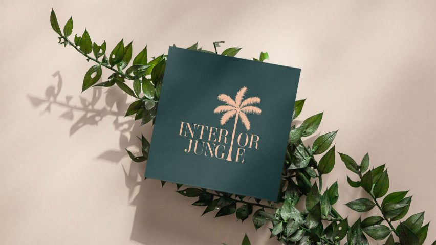 Business card with palm tree on it on top of leaves and beige background