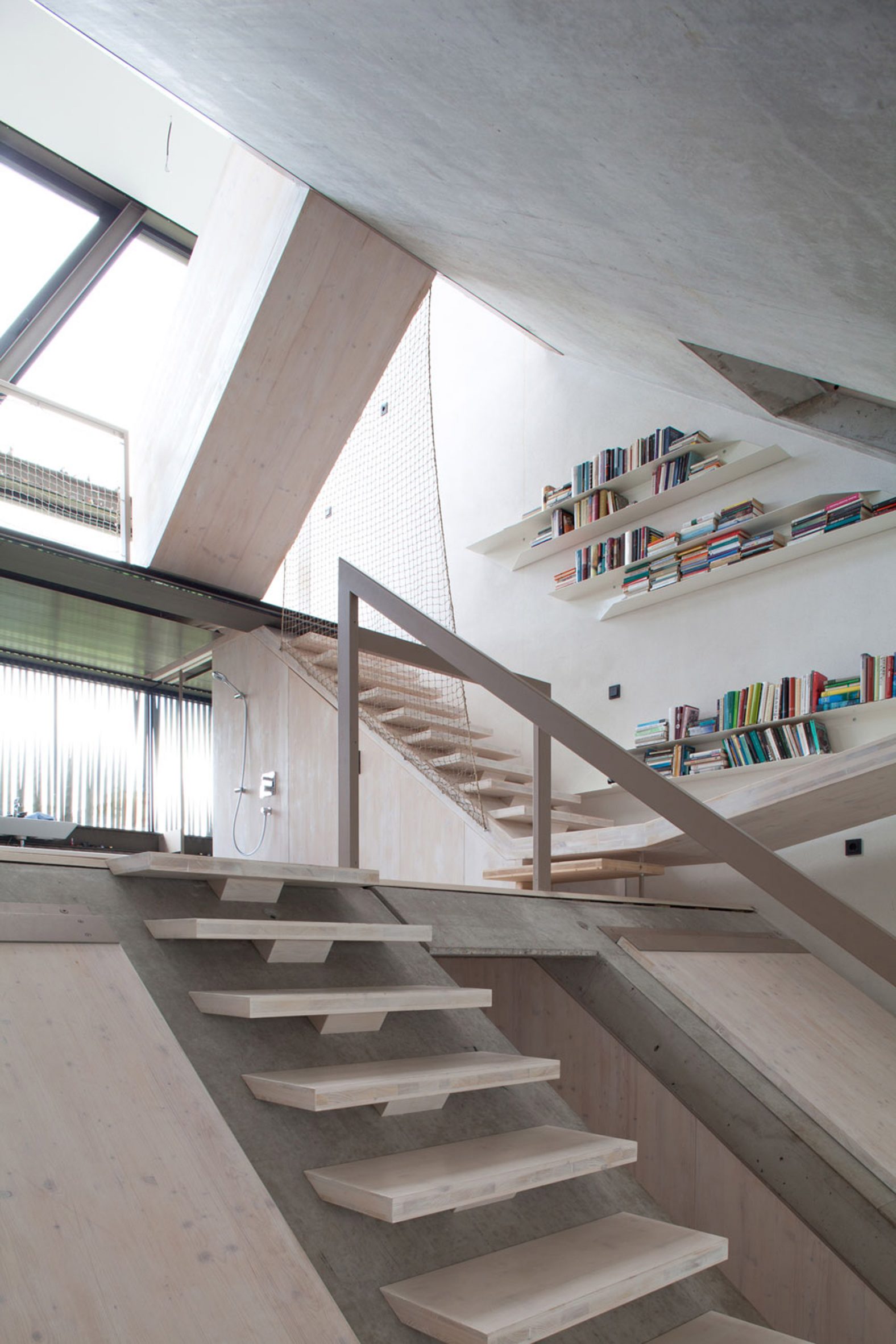 Slide staircase in townhouse by XTH-Berlin