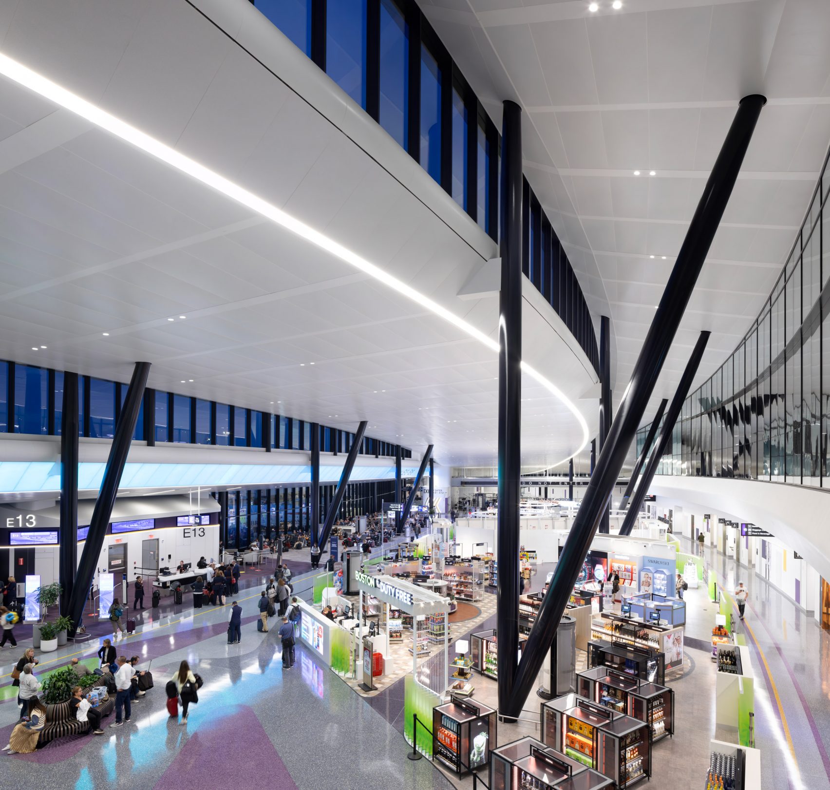 Aecom And Luis Vidal Place Sleek Red Roof On Boston Airport Terminal