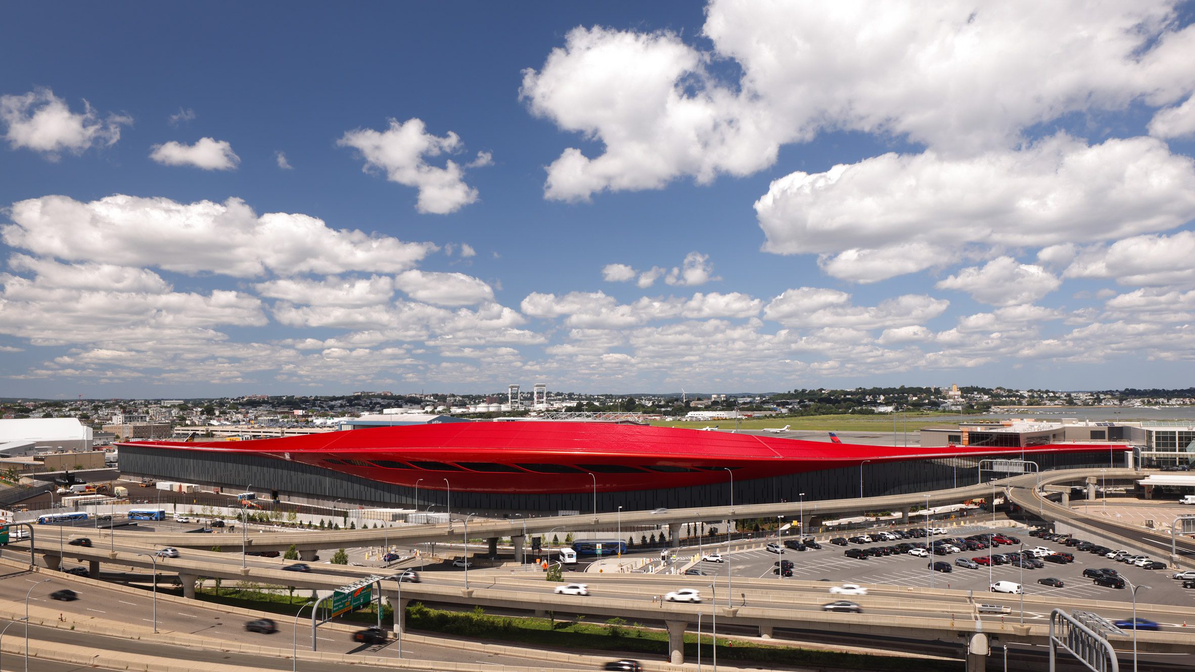 AECOM and Luis Vidal place sleek red roof on Boston airport terminal - Vimarsana News