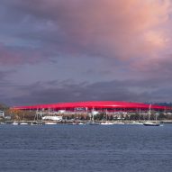 AECOM and Luis Vidal place sleek red roof on Boston airport terminal