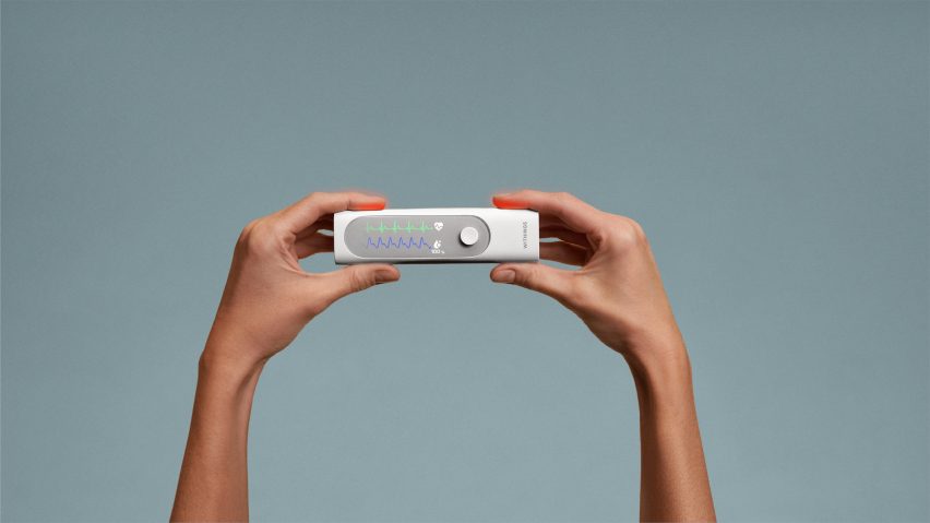 Photo of hands holding the Withings BeamO device horizontally between them like a game controller