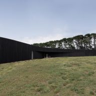 Charred timber exterior of Peninsula House by Wood Marsh