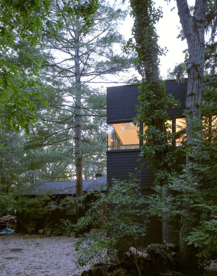 Black cabin in the woods