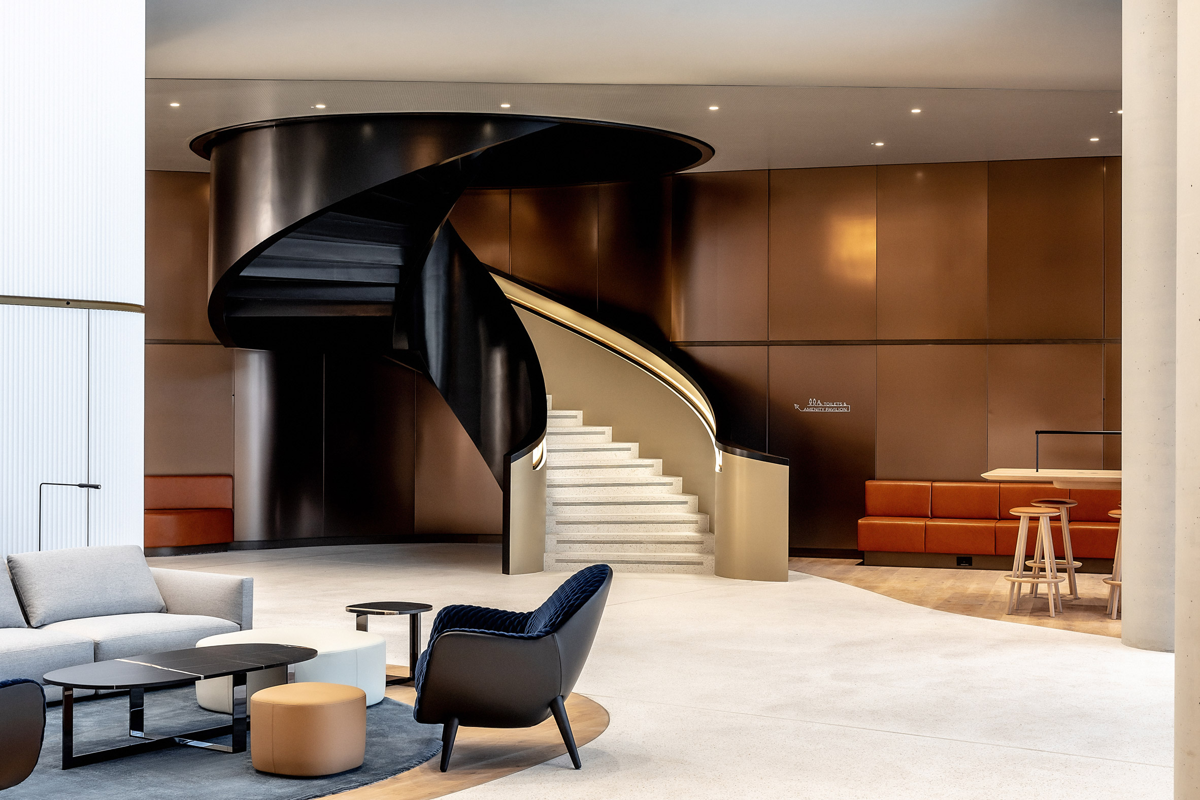 Warm interiors of 50 Electric Boulevard by Foster + Partners
