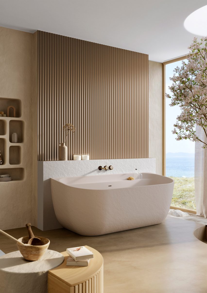Photo of the Acquabella Noon Slate bathtub within a luxurious bathroom finished in natural materials