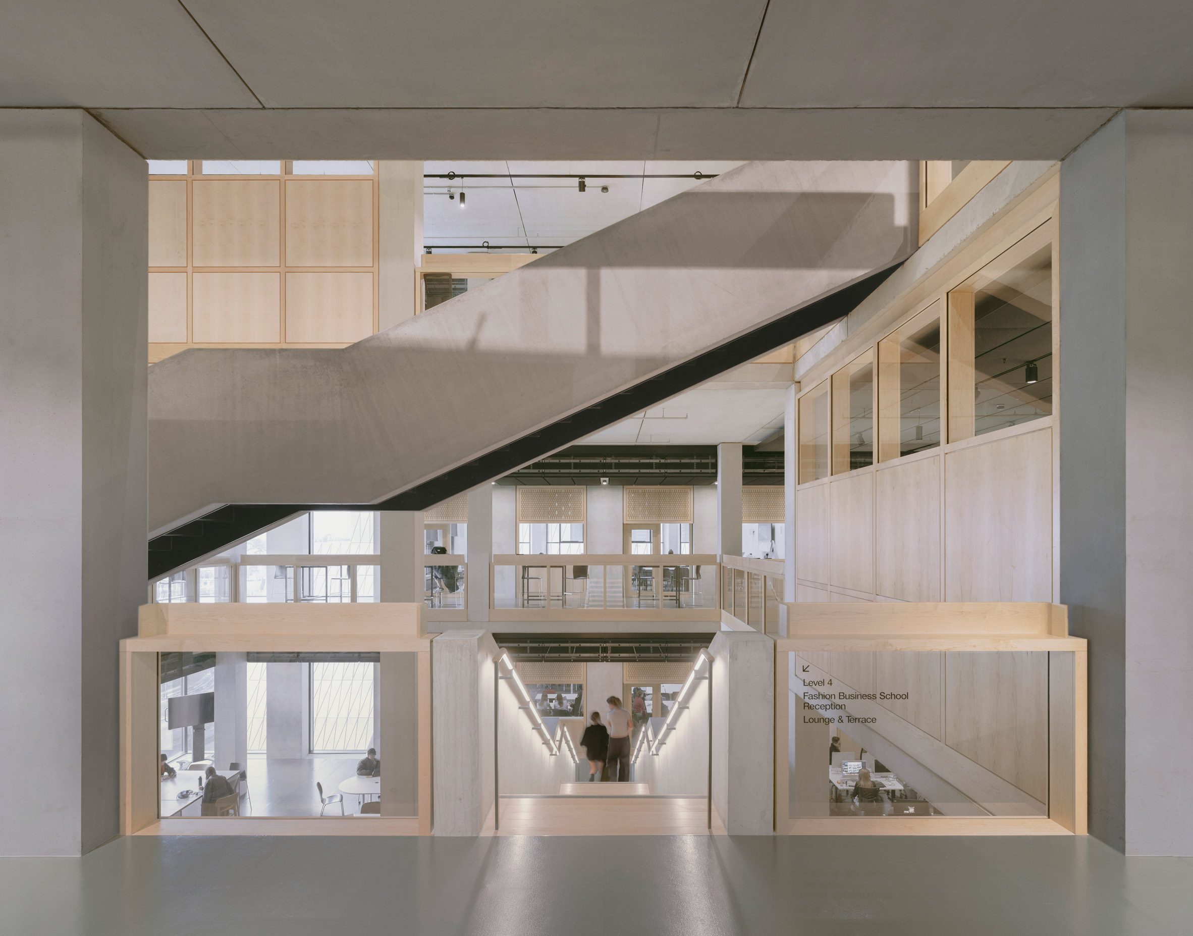 Corridor and stairwell within university campus by Allies and Morrison