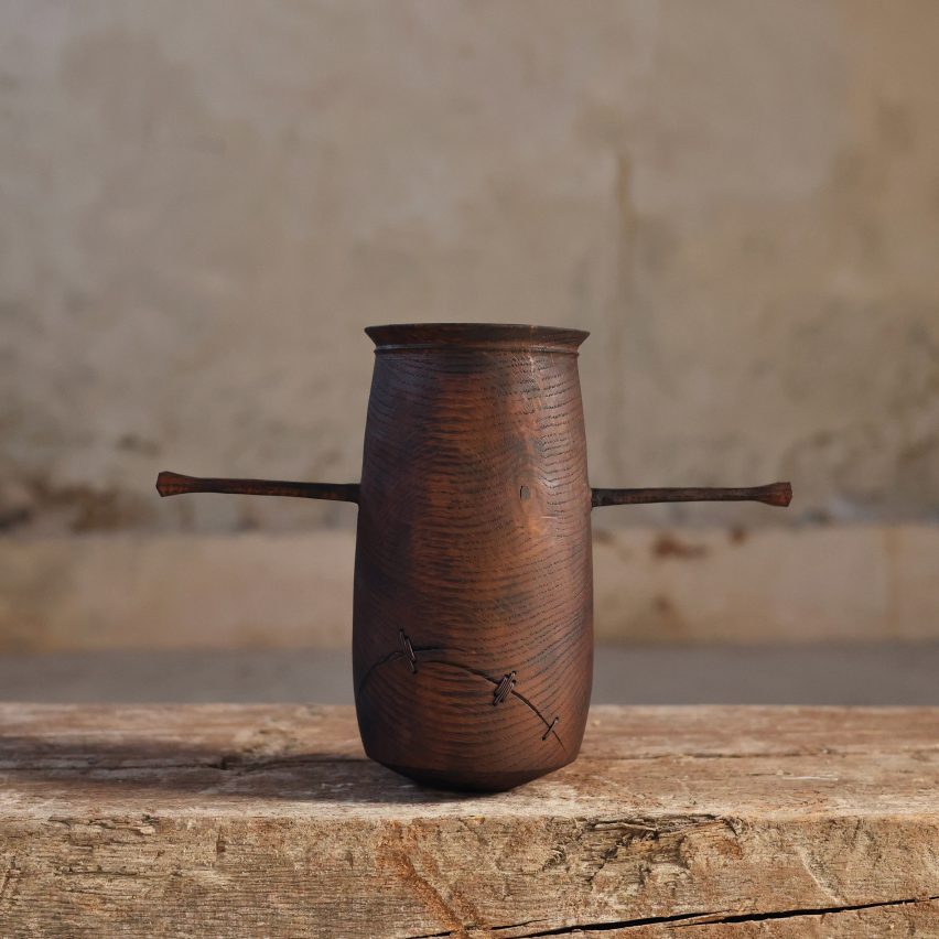 Small wooden vessel with mended crack from Novus collection 