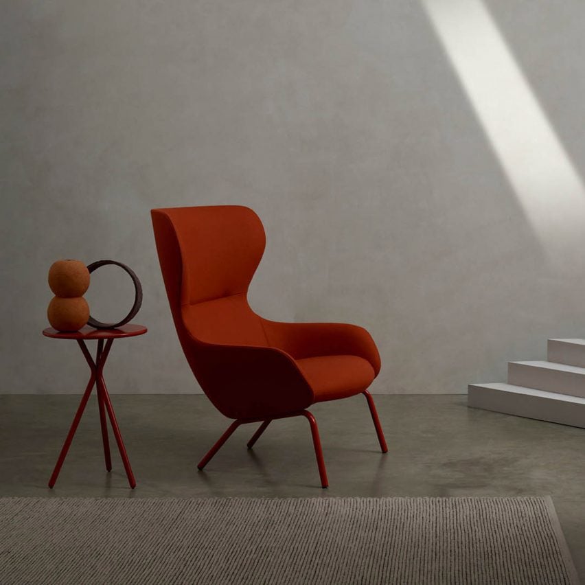 Red chair in a concrete room