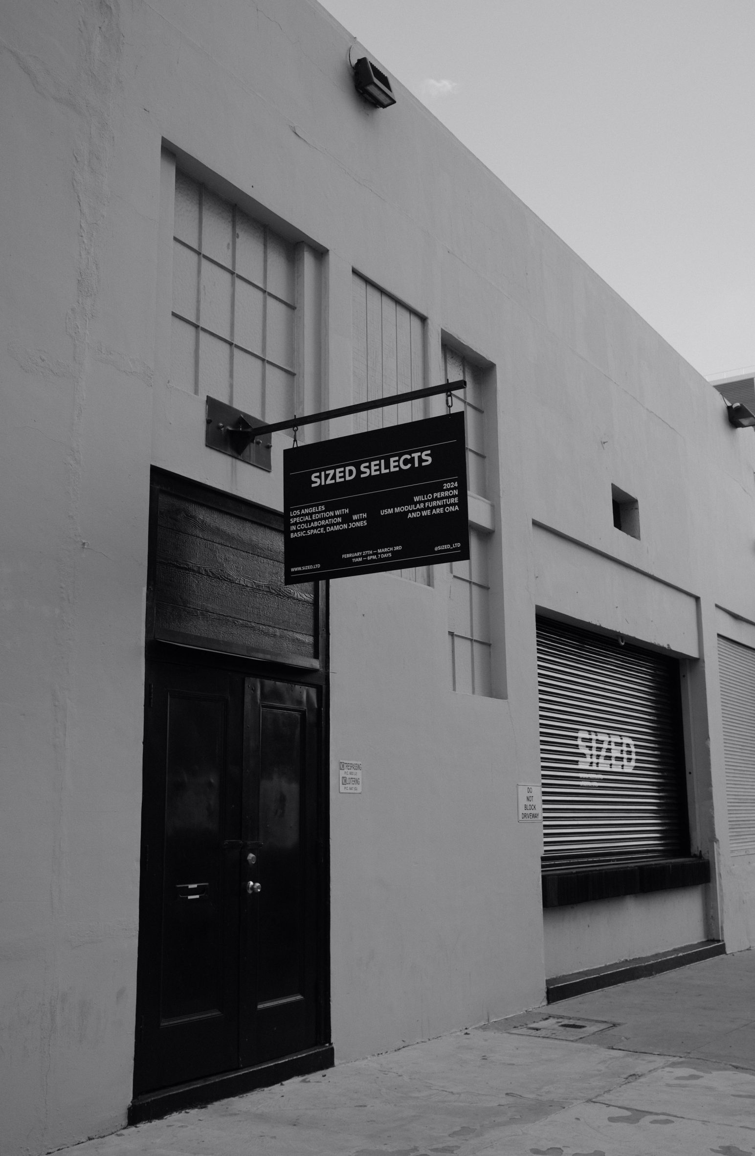 Sized selects sign on the front of white LA storefront