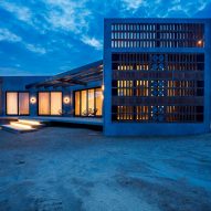 Concrete home in desert at night