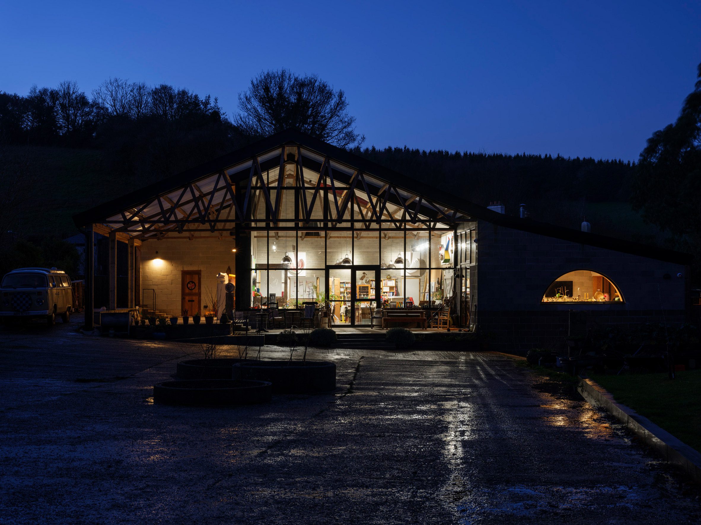 Night view of Cowshed by David Kohn Architects