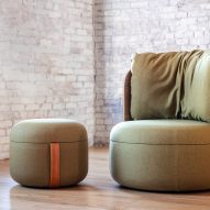 A curvilinear lounge chair from KFI Studio's Dotti collection with green upholstery