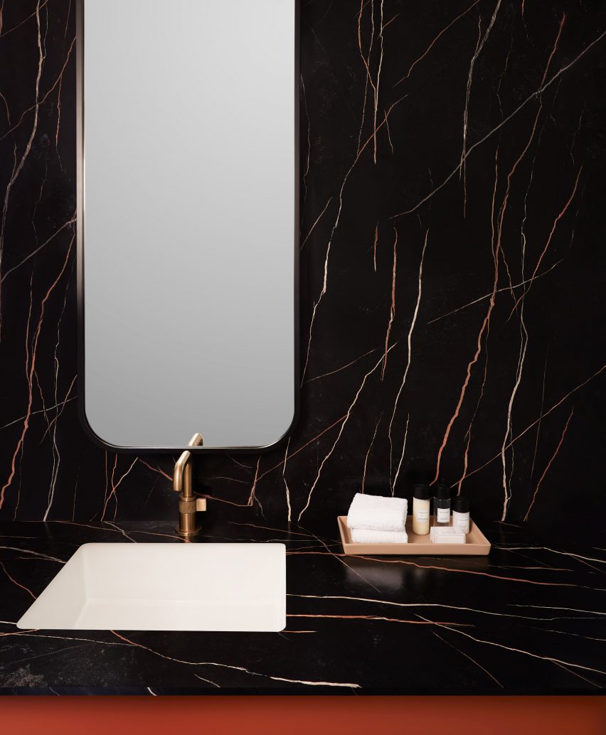 Dark surface by Formica Corporation in bathroom