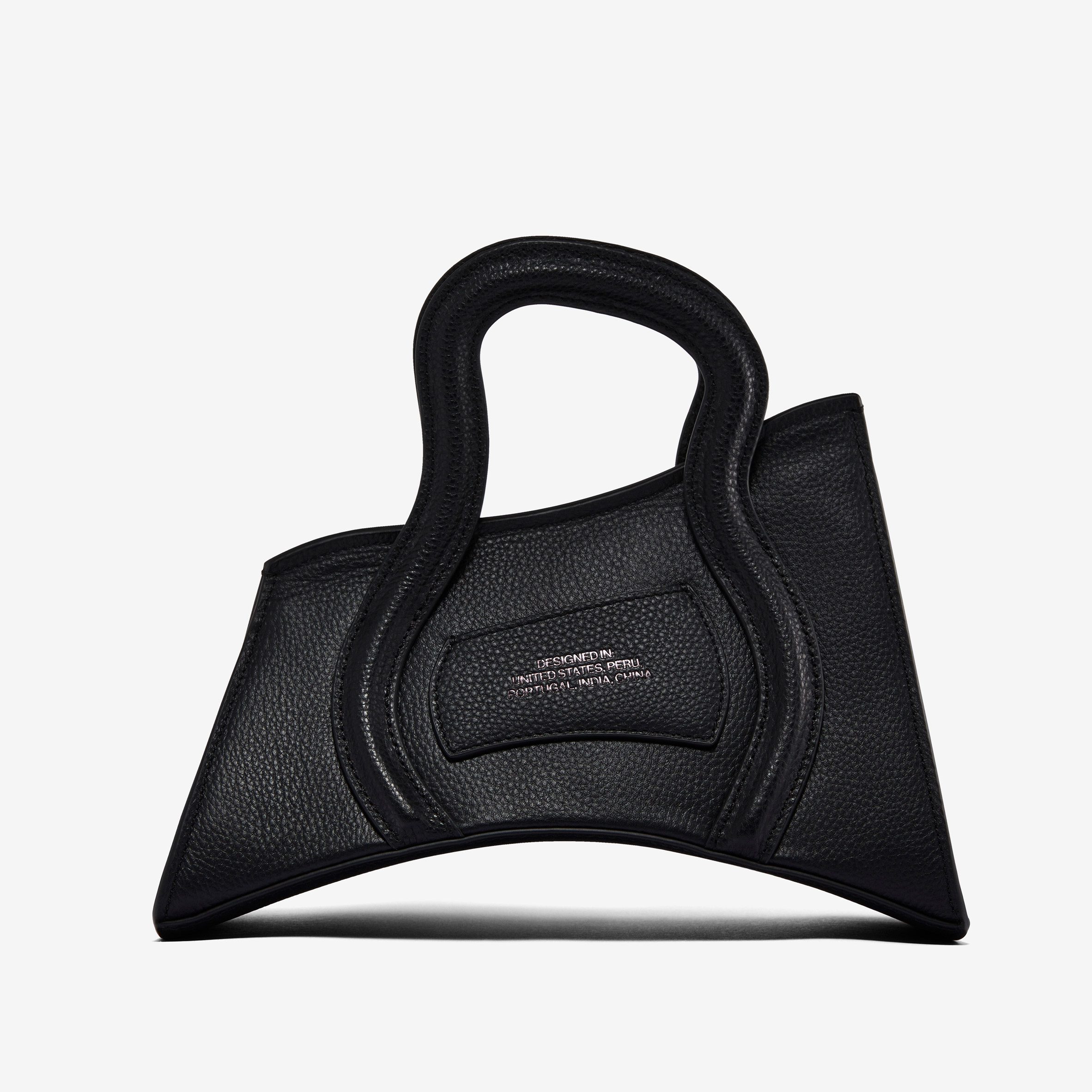A bag with a curved bottom and pointing corners