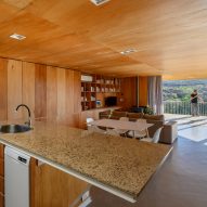 A kitchen clad in wood