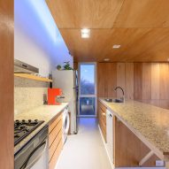 A kitchen with wood cabinetry