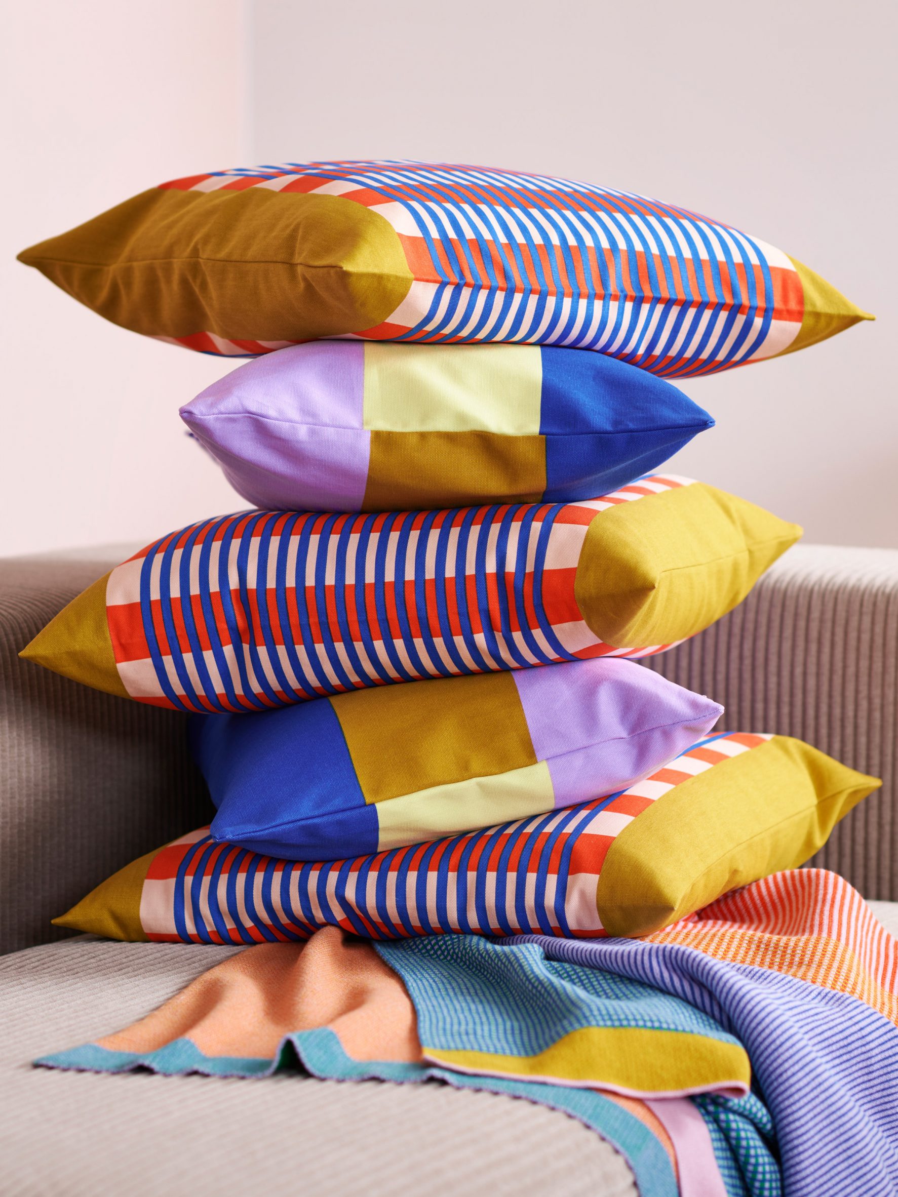 Stacked pillows from collection by Raw Color for IKEA