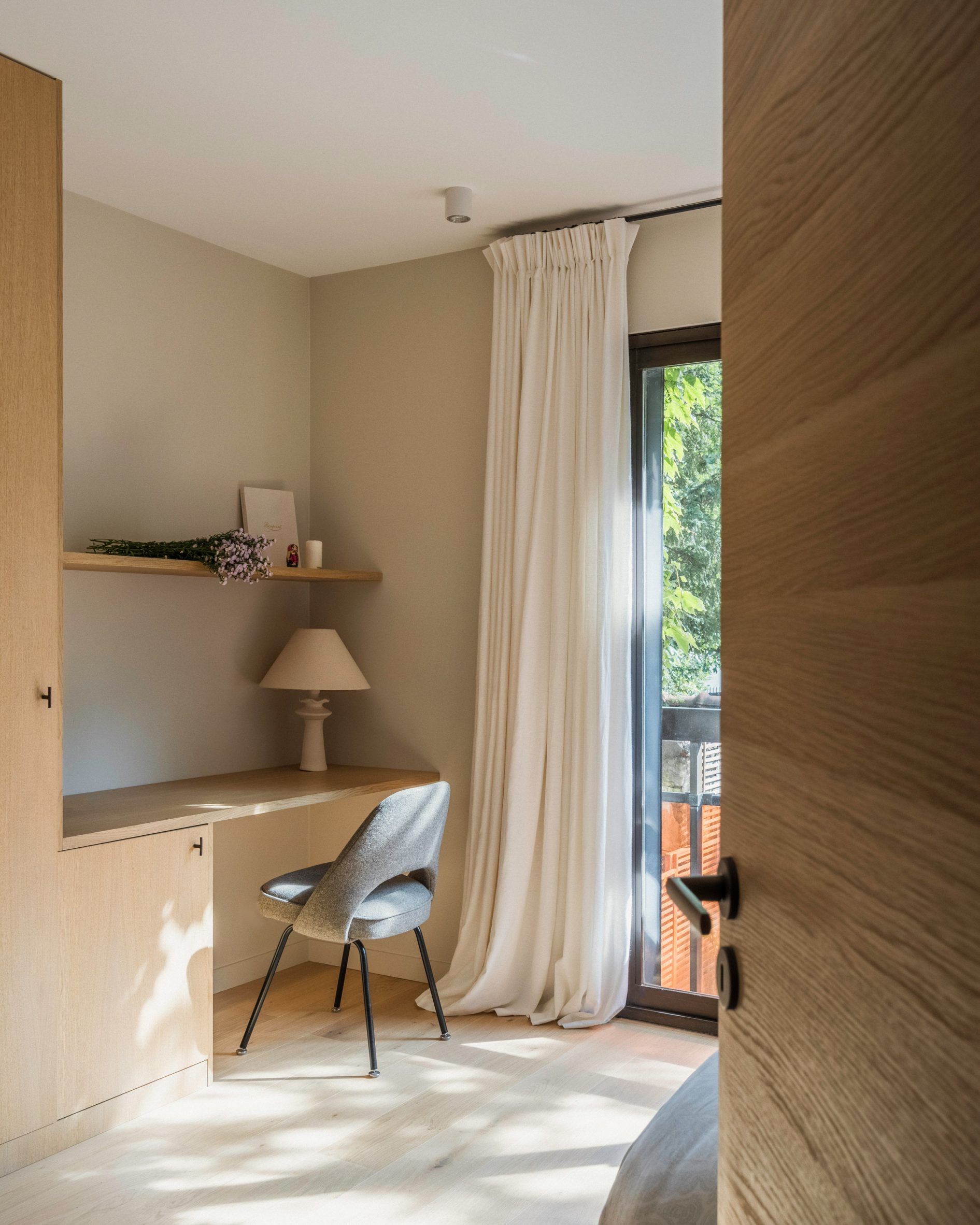 Bedroom of apartment by Johanna Amatoury