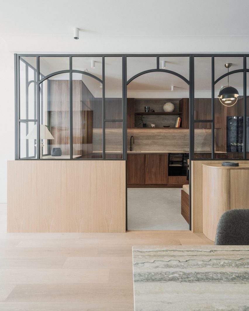 Kitchen of Paris apartment with glass partitions