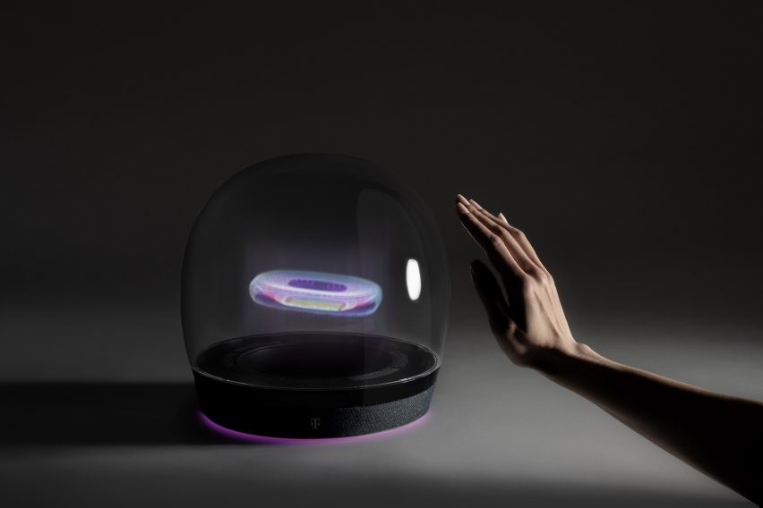 Photo of a prototype of Layer and Deutsche Telekom's Concept T holographic smarthome hub, showing a transparent domed unit containing a 3D holographic image