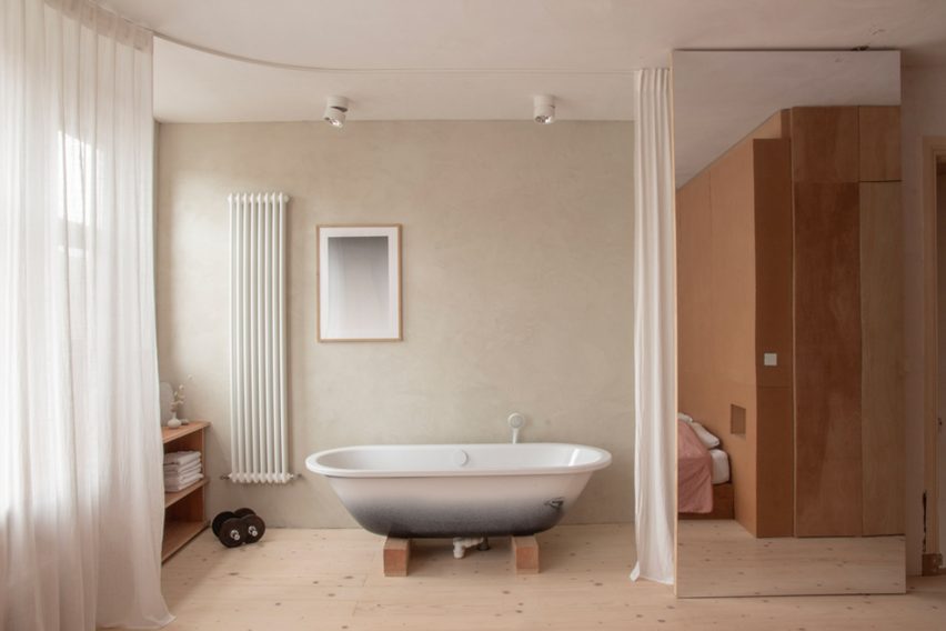 Bedroom bath at Ulli Heckmann's compact apartment in Rotterdam