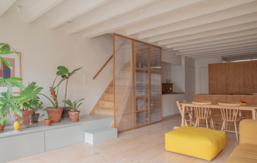 Kitchen and stairs at Ulli Heckmann's compact apartment in Rotterdam