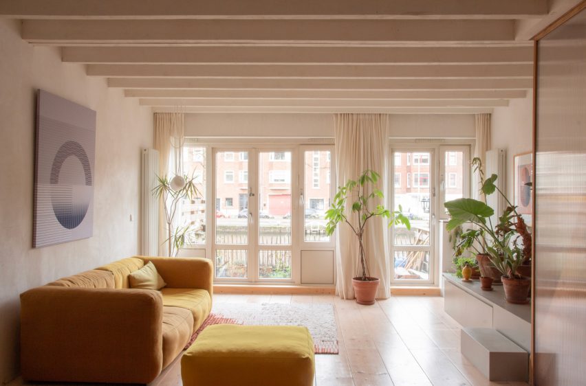 Living room and windows at Ulli Heckmann's compact apartment in Rotterdam