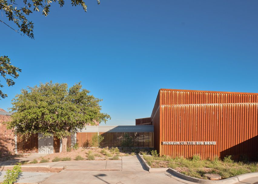 East Texas steel-clad museum with tree in the middle of a courtyard