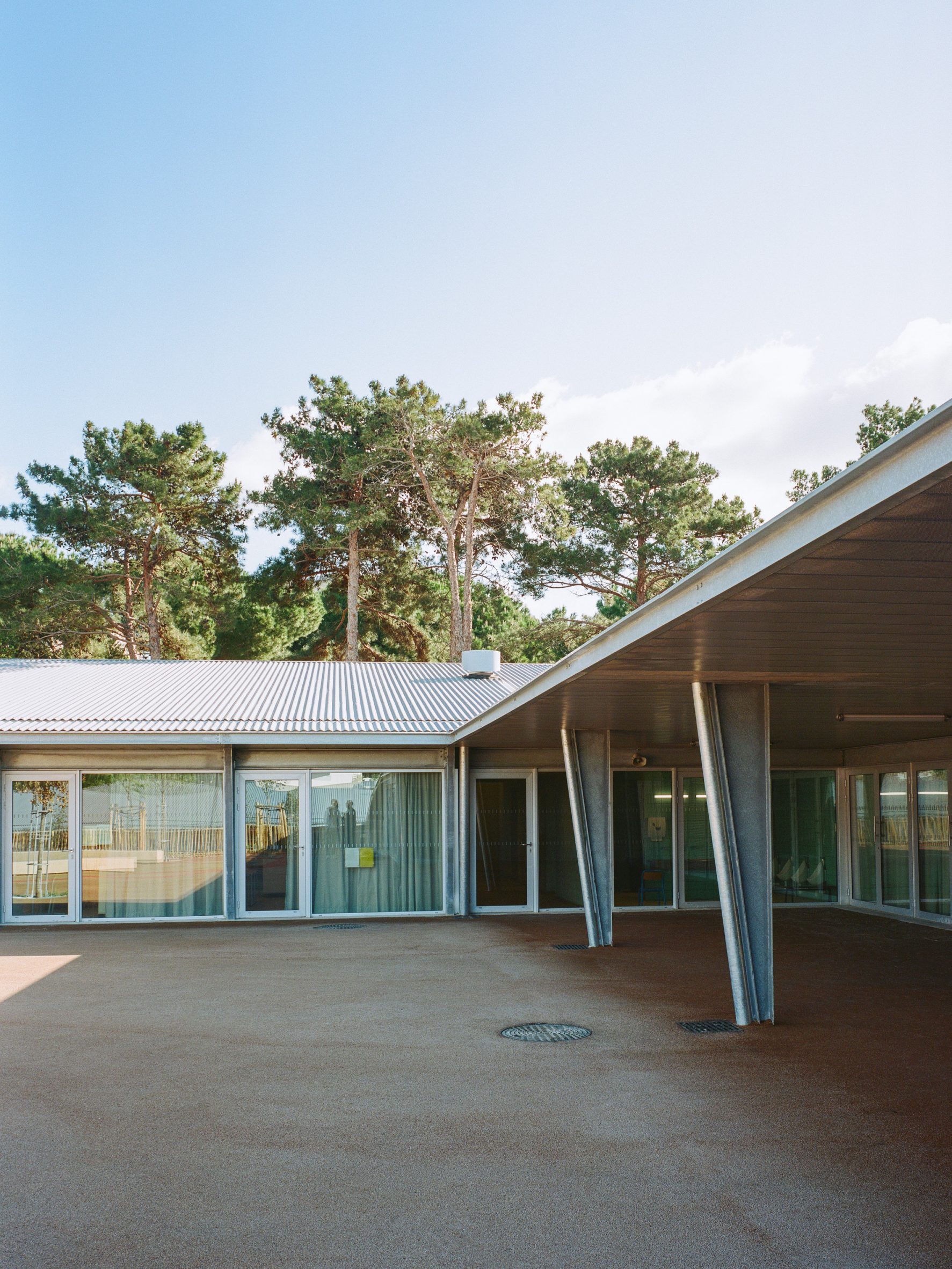 View of courtyard at school in France by Ateliers O-S and NAS Architecture