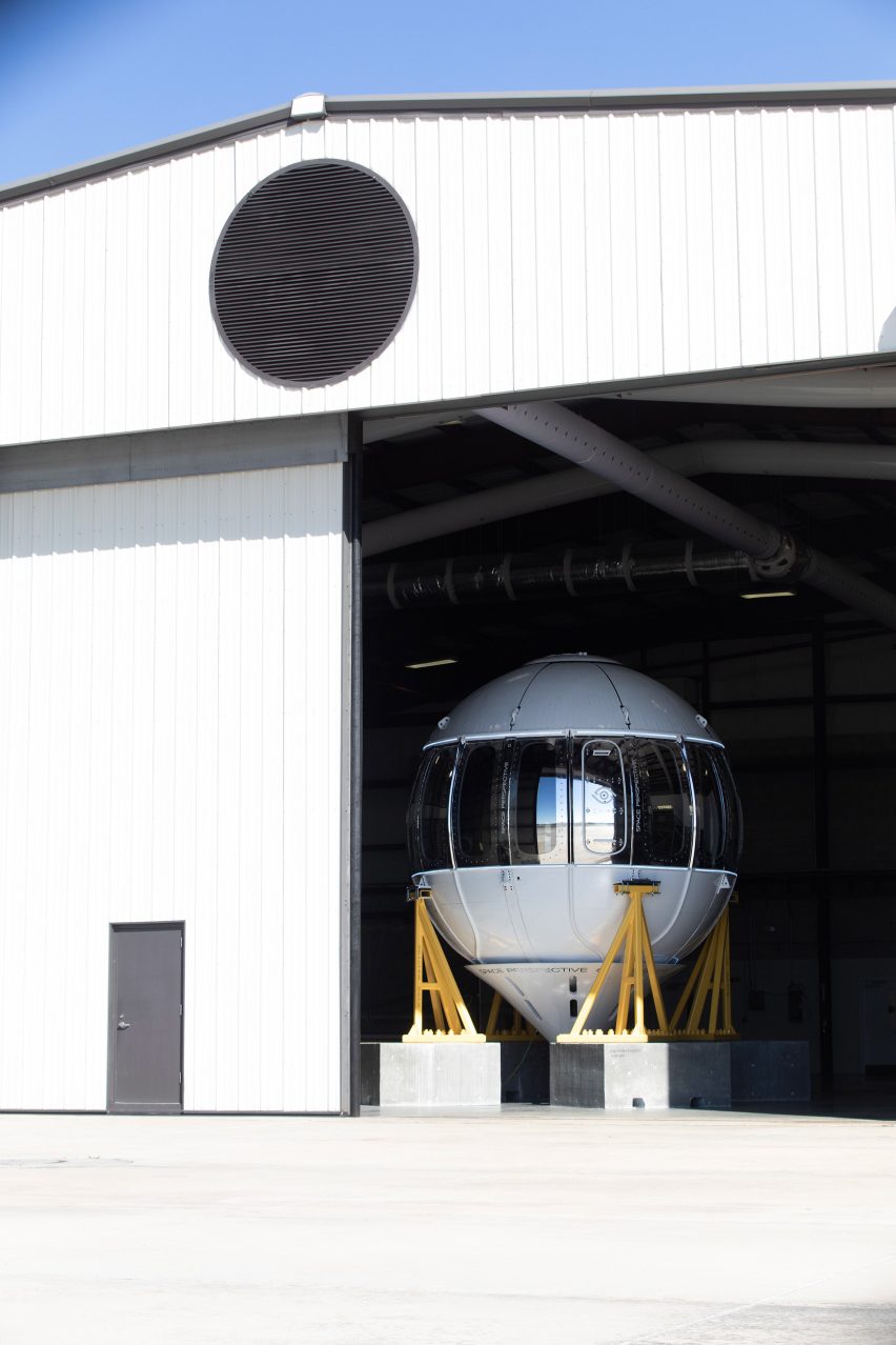 Excelsior test capsule in a hangar