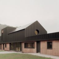 LCA Architetti nestles angular cork-clad home into Italian valley