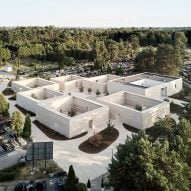 BDR Architekci clads columbarium in Poland with pale sandstone
