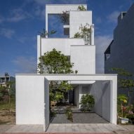 H-H Studio designs home in Vietnam as "a place to live, work, study, grow crops and entertain"