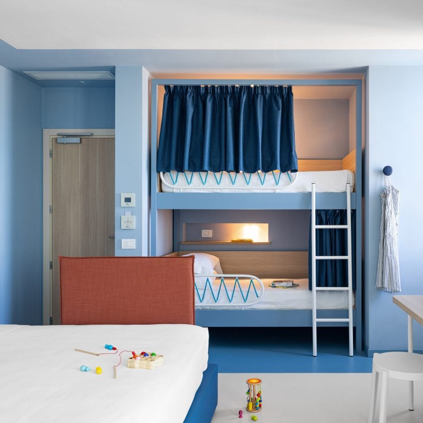 Bunk beds inside Hotel Haway in Martinsicuro, Italy, by Fiorini D'Amico Architetti (FDA)