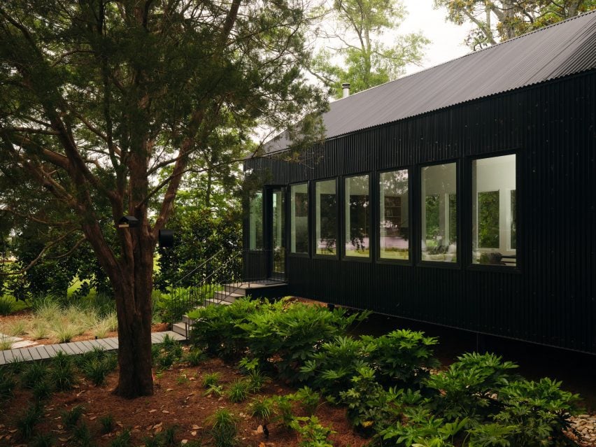 Black rectilinear cabin by Tall Architects