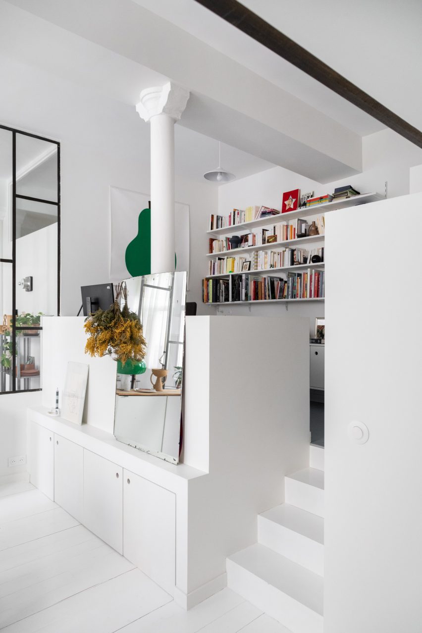 Raised platform housing home office in apartment by Isabelle Heilmann